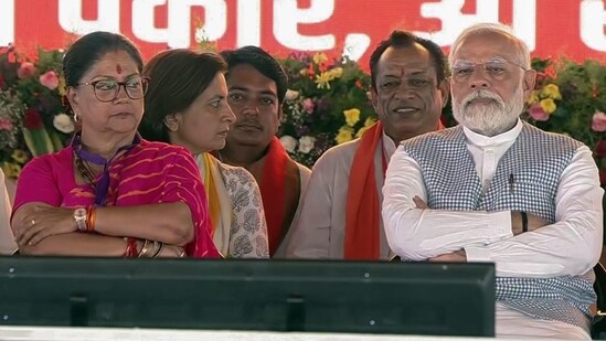 Prime Minister Narendra Modi with Bharatiya Janata Party (BJP) National Vice President Vasundhara Raje at a public meeting, (ANI)