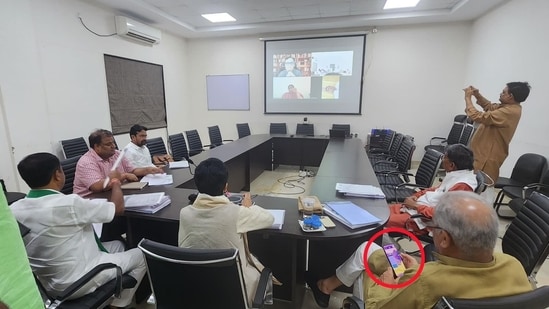 BJP's Amit Malviya shared a photograph from Congress meeting claiming Chhattisgarh CM was playing Candy Crush on his mobile phone.