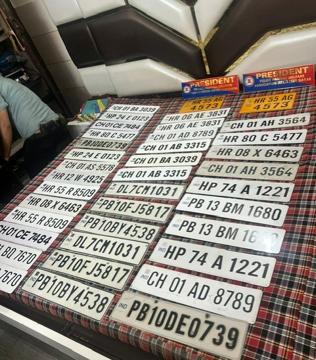 The fake registration plates recovered from the accused’s house in Chandigarh. (HT Photo) The fake registration plates recovered from the accused’s house in Chandigarh. (HT Photo)