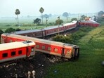 Coaches of the North-East Express passenger train that derailed late Wednesday near Raghunathpur railroad station in Buxar district of Bihar