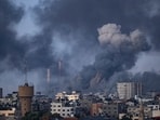Smoke rises following an Israeli airstrike in Gaza City Smoke rises following an Israeli airstrike in Gaza City