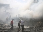 Palestinians look for survivors after an Israeli airstrike in Rafah refugee camp, southern Gaza Strip, Palestinians look for survivors after an Israeli airstrike in Rafah refugee camp, southern Gaza Strip,