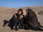 Afghan women mourn relatives killed in an earthquake at a burial site after an earthquake in Zenda Jan district in Herat province, western of Afghanistan. Afghan women mourn relatives killed in an earthquake at a burial site after an earthquake in Zenda Jan district in Herat province, western of Afghanistan.