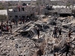 Palestinian search the rubble of destroyed buildings following an Israeli strike, as battles between Israel and the Hamas movement continue for the sixth consecutive day in the city of Rafah, in the southern Gaza Strip. (AFP) Palestinian search the rubble of destroyed buildings following an Israeli strike, as battles between Israel and the Hamas movement continue for the sixth consecutive day in the city of Rafah, in the southern Gaza Strip. (AFP)