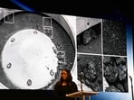 A picture of some of the sample matter collected from the asteroid is displayed during a press conference for the OSIRIS-REx sample unveiling at the Johnson Space Center in Houston, Texas on October 11.