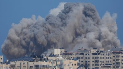 Smoke rises following an Israeli air strike in Gaza City on October 12. Israel's retaliation has escalated after Gaza's militant Hamas rulers launched an unprecedented attack on Israel on Saturday. The health ministry in Gaza has reported that the bombings have killed 1,417 Palestinians and wounded 6,238 since then. (Hatem Moussa/ AP) Smoke rises following an Israeli air strike in Gaza City on October 12. Israel's retaliation has escalated after Gaza's militant Hamas rulers launched an unprecedented attack on Israel on Saturday. The health ministry in Gaza has reported that the bombings have killed 1,417 Palestinians and wounded 6,238 since then. (Hatem Moussa/ AP)