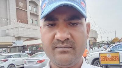 Bijender Shah, 43, a resident of Faridabad, was dragged alongside his own car on NH 48 for nearly 1km. (HT) Bijender Shah, 43, a resident of Faridabad, was dragged alongside his own car on NH 48 for nearly 1km. (HT)