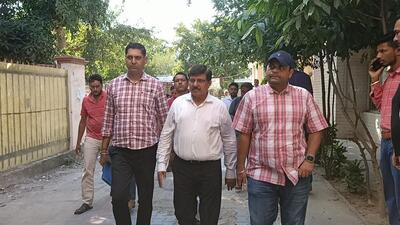 Haryana IAS officer Jaivir Singh Arya (centre) being brought to a Panchkula court on Thursday. (Sant Arora/HT)