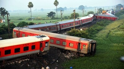 Coaches of the North-East Express passenger train that derailed late Wednesday near Raghunathpur railroad station in Buxar district of Bihar (AP) Coaches of the North-East Express passenger train that derailed late Wednesday near Raghunathpur railroad station in Buxar district of Bihar (AP)