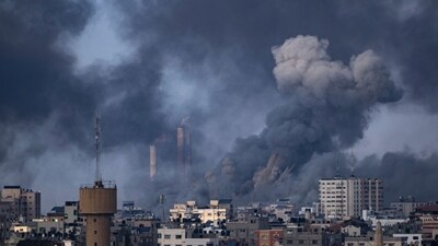 Smoke rises following an Israeli airstrike in Gaza City (AP) Smoke rises following an Israeli airstrike in Gaza City (AP)