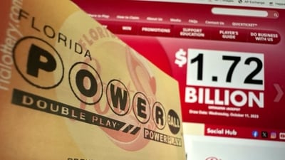 A Powerball lottery ticket is shown, Wednesday, Oct. 11, 2023, in Surfside, Fla. (AP Photo/Wilfredo Lee) (AP) A Powerball lottery ticket is shown, Wednesday, Oct. 11, 2023, in Surfside, Fla. (AP Photo/Wilfredo Lee) (AP)