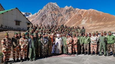 PM Modi poses with security forces personnel pose in Pithoragarh district, Uttarakhand. (PTI) PM Modi poses with security forces personnel pose in Pithoragarh district, Uttarakhand. (PTI)