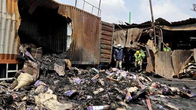The fire took place at Shree Balaji Traders, a firecracker shop-cum-godown in Attibele near Bengaluru, on October 7 when crackers were being unloaded from a vehicle into the godown. (PTI) The fire took place at Shree Balaji Traders, a firecracker shop-cum-godown in Attibele near Bengaluru, on October 7 when crackers were being unloaded from a vehicle into the godown. (PTI)