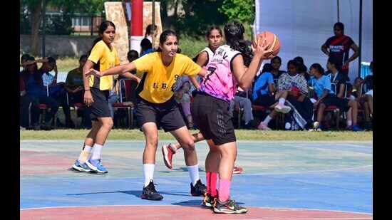 Players in action during the basketball match between Ludhiana and Jalandhar team in state level games played at PAU in Ludhiana on Thursday. (HT Photo)