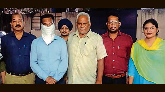 The accused in the custody of VB officials in Ludhiana on Thursday. (HT Photo)