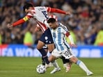 Argentina's Lionel Messi battles for the ball with Paraguay's Gustavo Gomez during a qualifying match for the FIFA World Cup 2026 Argentina's Lionel Messi battles for the ball with Paraguay's Gustavo Gomez during a qualifying match for the FIFA World Cup 2026