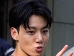 BTS' Jungkook wore a grey outfit.