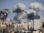 TOPSHOT - Smoke plumes billow during Israeli air strikes in Gaza City on October 12, 2023. TOPSHOT - Smoke plumes billow during Israeli air strikes in Gaza City on October 12, 2023.