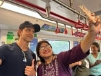 Hrithik Roshan poses with a commuter for a selfie in the Mumbai metro Hrithik Roshan poses with a commuter for a selfie in the Mumbai metro