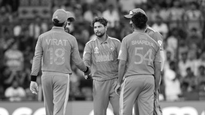 Kuldeep Yadav with teammates after picking up a wicket vs Afghanistan (Rohit Chawla)
