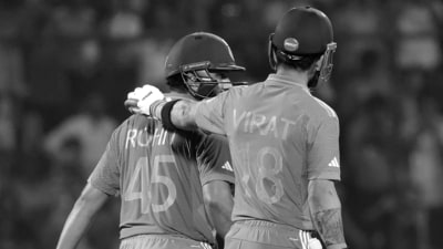 Virat Kohli pats Rohit Sharma after his dismissal (Rohit Chawla)