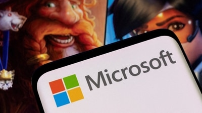 FILE PHOTO: Microsoft logo is seen on a smartphone placed on displayed Activision Blizzard's games characters in this illustration taken January 18, 2022. REUTERS/Dado Ruvic/Illustration/File Photo