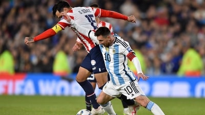Argentina's Lionel Messi battles for the ball with Paraguay's Gustavo Gomez during a qualifying match for the FIFA World Cup 2026 (AP) Argentina's Lionel Messi battles for the ball with Paraguay's Gustavo Gomez during a qualifying match for the FIFA World Cup 2026 (AP)