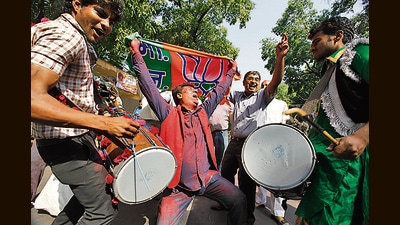 BJP supporters celebrate in New Delhi as election results show a landslide win for the BJP led NDA on May 16, 2014. (Raj K Raj/Hindustan Times)