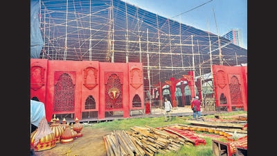 Chaudhary has chosen the ‘sheesh mahal divya jyoti mandir’ theme for the pandal, which will have electric diyas and some carvings with 25 chandeliers. “Although I have a team of skilled workers to set up the pandal, working during rains was a challenge,” Chaudhary said (HT PHOTO) Chaudhary has chosen the ‘sheesh mahal divya jyoti mandir’ theme for the pandal, which will have electric diyas and some carvings with 25 chandeliers. “Although I have a team of skilled workers to set up the pandal, working during rains was a challenge,” Chaudhary said (HT PHOTO)