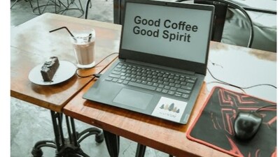Laptop displaying the text 'good coffee, good spirit' placed on a table, available at Flipkart's Big Billion Days Deals. (Pexela ) Laptop displaying the text 'good coffee, good spirit' placed on a table, available at Flipkart's Big Billion Days Deals. (Pexela )