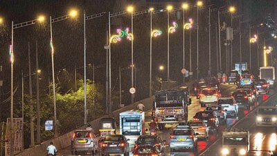 Mumbai, India - Sept. 21, 2023: Decorative lights on light poles at Western Express Highway, Magathane Flyover Some lights are not working in Mumbai, India, on Thursday, September 21, 2023. (Photo by Satish Bate/ Hindustan Times) (Hindustan Times) Mumbai, India - Sept. 21, 2023: Decorative lights on light poles at Western Express Highway, Magathane Flyover Some lights are not working in Mumbai, India, on Thursday, September 21, 2023. (Photo by Satish Bate/ Hindustan Times) (Hindustan Times)