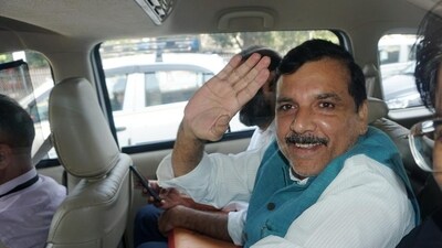 AAP MP Sanjay Singh being taken to the Rouse Avenue Court by the Enforcement Directorate officials on October 10. (PTI) AAP MP Sanjay Singh being taken to the Rouse Avenue Court by the Enforcement Directorate officials on October 10. (PTI)