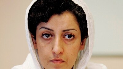FILE - Iranian Narges Mohammadi, delegate of the Center for Human Rights Defenders, listens to a question during a press conference on the Assessment of the Human Rights Situation in Iran, at the U.N. headquarters in Geneva, Switzerland, on June 9, 2008. The Nobel Peace Prize has been awarded to Narges Mohammadi for fighting oppression of women in Iran. The chair of the Norwegian Nobel Committee announced the prize Friday, Oct. 6, 2023 in Oslo. (Magali Girardin/Keystone via AP, File) (AP) FILE - Iranian Narges Mohammadi, delegate of the Center for Human Rights Defenders, listens to a question during a press conference on the Assessment of the Human Rights Situation in Iran, at the U.N. headquarters in Geneva, Switzerland, on June 9, 2008. The Nobel Peace Prize has been awarded to Narges Mohammadi for fighting oppression of women in Iran. The chair of the Norwegian Nobel Committee announced the prize Friday, Oct. 6, 2023 in Oslo. (Magali Girardin/Keystone via AP, File) (AP)