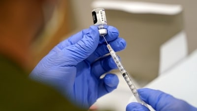 FILE - A healthcare worker fills a syringe with the Pfizer COVID-19 vaccine at Jackson Memorial Hospital on Oct. 5, 2021, in Miami. VAIDS is not a real condition, experts say. The co-authors of the study say their work is being misrepresented and doesn’t show that the vaccine is harmful to the immune system. The false claim is spreading as U.S. health officials recommend most Americans receive an updated COVID-19 vaccine. (AP Photo/Lynne Sladky, File) (AP) FILE - A healthcare worker fills a syringe with the Pfizer COVID-19 vaccine at Jackson Memorial Hospital on Oct. 5, 2021, in Miami. VAIDS is not a real condition, experts say. The co-authors of the study say their work is being misrepresented and doesn’t show that the vaccine is harmful to the immune system. The false claim is spreading as U.S. health officials recommend most Americans receive an updated COVID-19 vaccine. (AP Photo/Lynne Sladky, File) (AP)