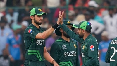 Pakistan's Shaheen Afridi and captain Babar Azam celebrate the wicket of Sri Lanka's Dhananjaya de Silva during ICC Men's Cricket World Cup 2023 match between Pakistan and Sri Lanka (PTI) Pakistan's Shaheen Afridi and captain Babar Azam celebrate the wicket of Sri Lanka's Dhananjaya de Silva during ICC Men's Cricket World Cup 2023 match between Pakistan and Sri Lanka (PTI)