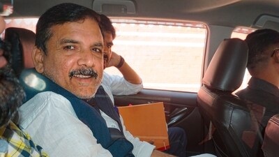 AAP MP Sanjay Singh being taken to the Rouse Avenue Court by the Enforcement Directorate (ED) officials. (PTI) AAP MP Sanjay Singh being taken to the Rouse Avenue Court by the Enforcement Directorate (ED) officials. (PTI)