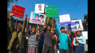 People during a protest to show solidarity with Palestine, in Budgam on Friday. (Waseem Andrabi /HT) People during a protest to show solidarity with Palestine, in Budgam on Friday. (Waseem Andrabi /HT)