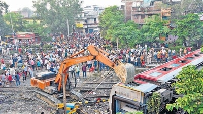 Rescue operation underway near Raghunathpur station in Bihar’s Buxar district on Thursday. (PTI) Rescue operation underway near Raghunathpur station in Bihar’s Buxar district on Thursday. (PTI)