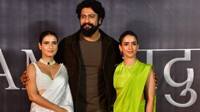 At the teaser launch of Sam Bahadur, Vicky Kaushal posed with his co-stars. Sam Bahadur stars Fatima Sana Sheikh as Indira Gandhi and Sanya Malhotra as Sam Manekshaw's wife Siloo. Sam Bahadur is all set to release worldwide on December 1. At the teaser launch of Sam Bahadur, Vicky Kaushal posed with his co-stars. Sam Bahadur stars Fatima Sana Sheikh as Indira Gandhi and Sanya Malhotra as Sam Manekshaw's wife Siloo. Sam Bahadur is all set to release worldwide on December 1.