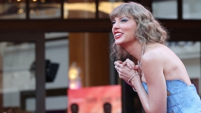 Taylor Swift's "Eras Tour" concert film is set to become the big movie event of the fall. Why is she so successful? (Reuters)