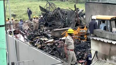 The fire took place at the firecracker shop-cum-godown on October 7 at Attibele when crackers were being unloaded from a vehicle into the godown. (PTI) The fire took place at the firecracker shop-cum-godown on October 7 at Attibele when crackers were being unloaded from a vehicle into the godown. (PTI)