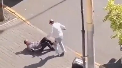 A video circulating on social media appears to show that the man was stabbed with a knife.