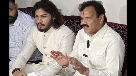 Punjab BJP vice-president Raj Kumar Verka (right) addressing a press conference at his residence in Amritsar on Friday. He was accompanied by his nephew, Priyanshu Verka, and supporters. (Sameer Sehgal/HT)