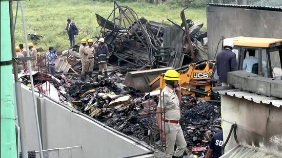 The fire took place at the firecracker shop-cum-godown on October 7 at Attibele when crackers were being unloaded from a vehicle into the godown. (PTI)