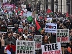 Israel-Hamas War: People walk down Regent Street as they take part in a 'March For Palestine', part of a pro-Palestinian national demonstration, in London. Israel-Hamas War: People walk down Regent Street as they take part in a 'March For Palestine', part of a pro-Palestinian national demonstration, in London.