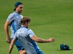 England's Jos Buttler (L) and David Willey attend a practice session. England's Jos Buttler (L) and David Willey attend a practice session.