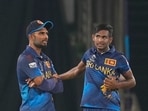 Sri Lanka's captain Dasun Shanaka, left, speaks to Matheesha Pathirana during the ICC Cricket World Cup match between Pakistan and Sri Lanka in Hyderabad Sri Lanka's captain Dasun Shanaka, left, speaks to Matheesha Pathirana during the ICC Cricket World Cup match between Pakistan and Sri Lanka in Hyderabad