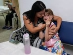 Israelis take cover in a shelter as a siren sounds a warning of incoming rockets fired from the Gaza strip, in Ashkelon, Israel, Israelis take cover in a shelter as a siren sounds a warning of incoming rockets fired from the Gaza strip, in Ashkelon, Israel,