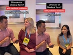 Medical educator quizzes doctors. 