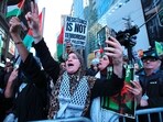 Supporters of Palestine protest in Times Square, New York on October 13, 2023. Supporters of Palestine protest in Times Square, New York on October 13, 2023.